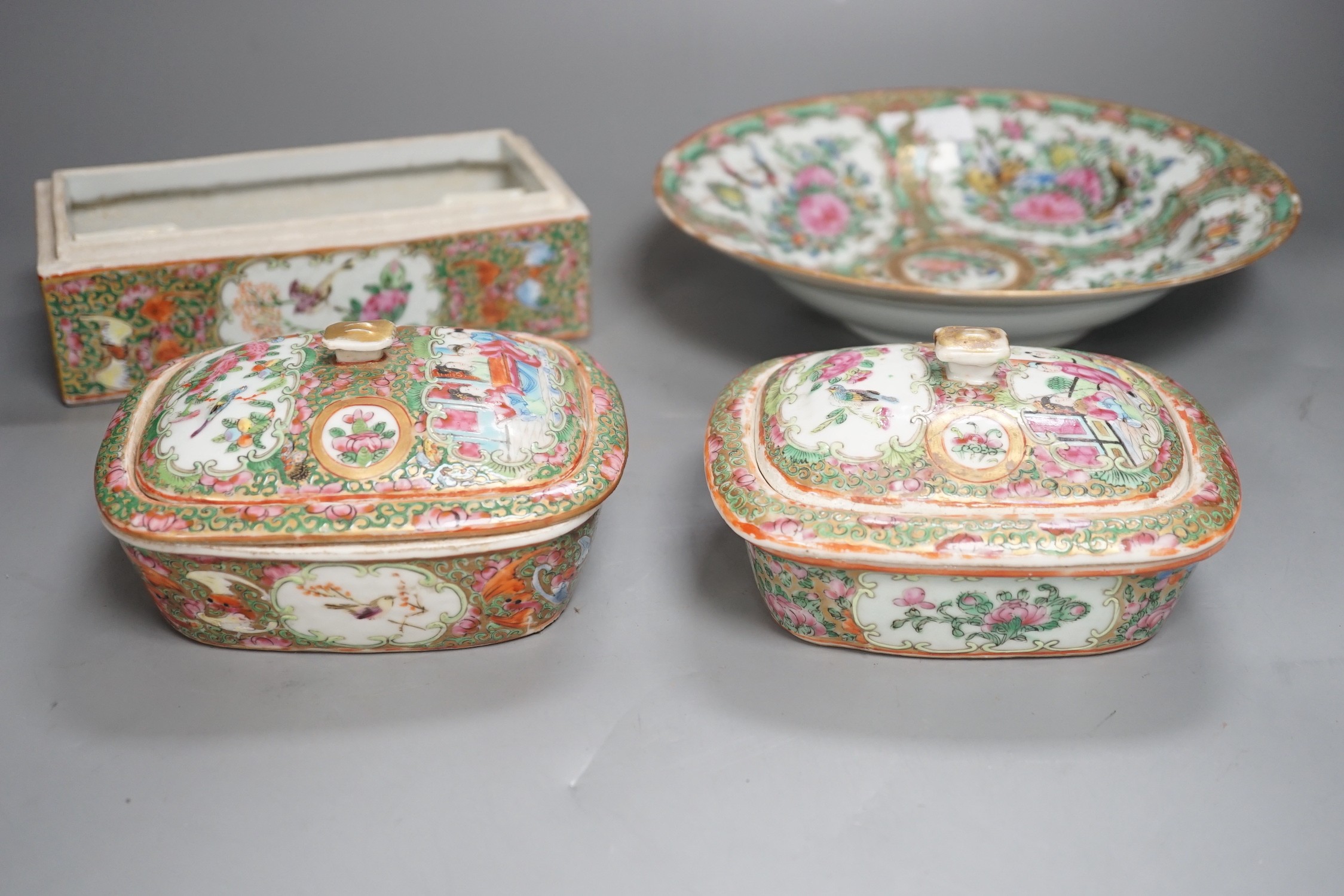 A group of 19th century Chinese famille rose porcelain - two soap dishes, strainers and covers, a plate and a pen box base